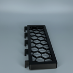 Détail du support Switch SKÅDIS noir : motif nid d'abeille et crochets