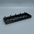 Support Switch SKÅDIS noir seul, structure alvéolée et crochets de fixation